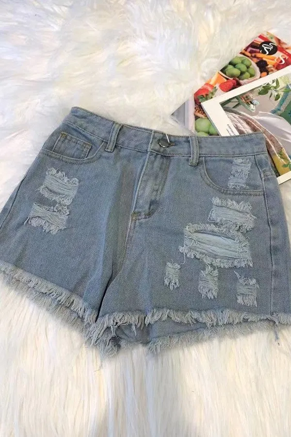 Destressed blue Jean shorts
