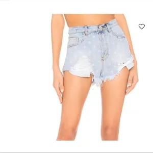 Superdown Revolve Kenzie Star Denim Shorts in Light Blue Wash​​​​​​​​​